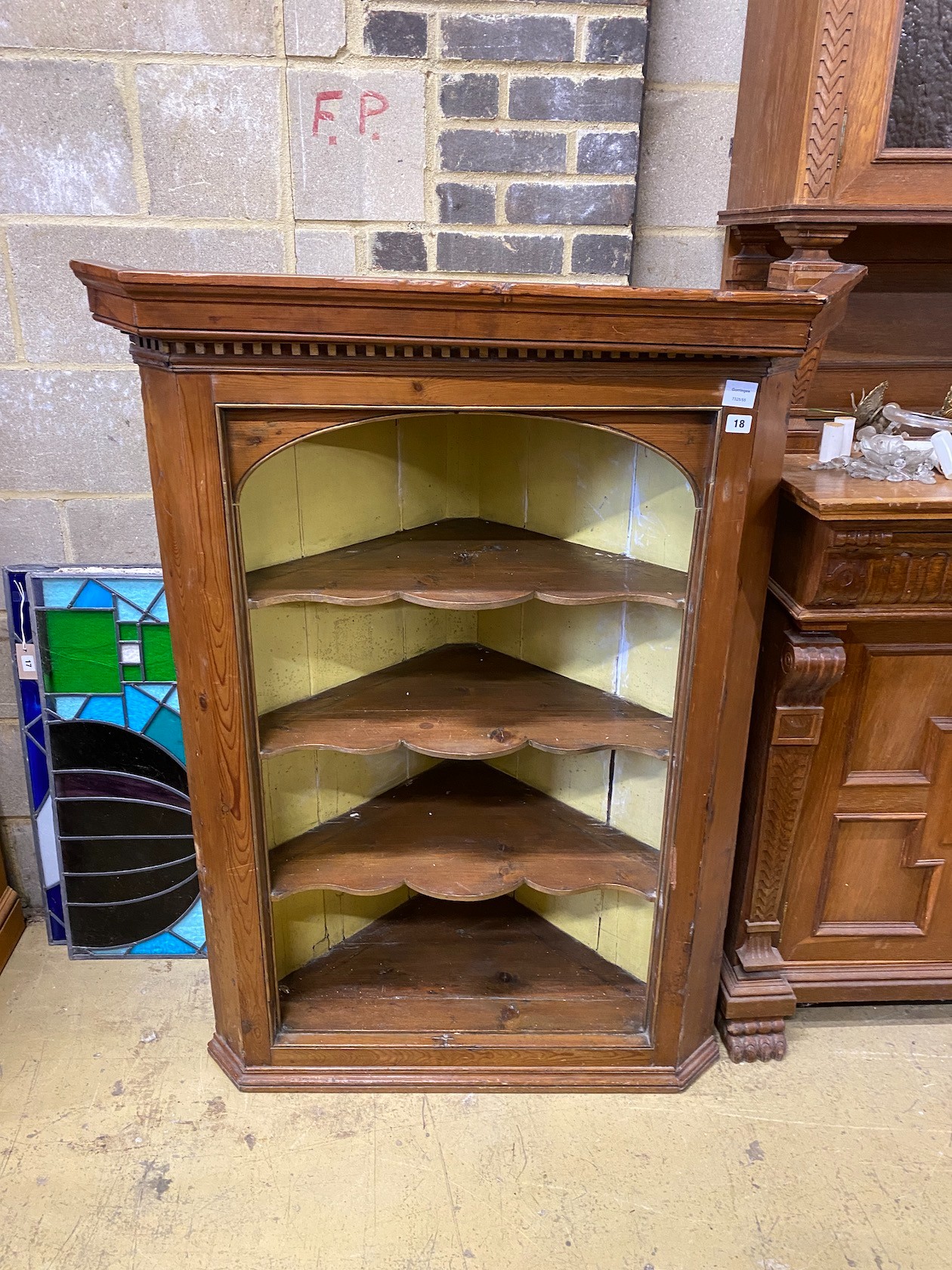 A Victorian pine open fronted hanging corner cupboard, width 99cm, depth 55cm, height 132cm